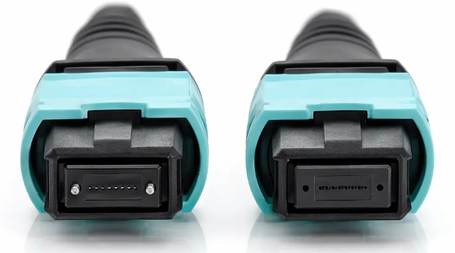 Comparison between standard MPO connector design and enhanced MTP-style connector design
